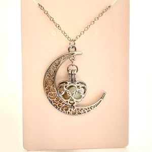Bundle 3 for $30. Silver Moon and heart locket glow in the dark necklace.